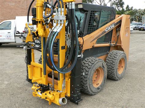 skid steer drilling|skid steer well drilling attachment.